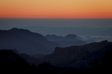 Beautiful sunset in the mountains. Canary Islands. The top of Terenif