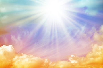 Abstract. Fog and clouds looking up into a fantasy multicolored sky. The bright red sun illuminates the whole picture.