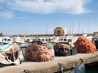 Various boats moored in the harbor