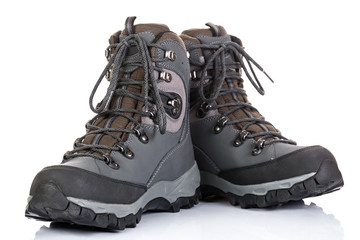 Tourist boots for mountain hikes with reinforced soles and membrane material.