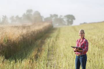 female farmer harvesting