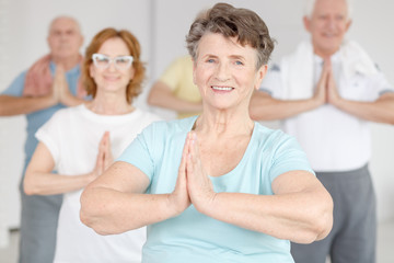 Smiling woman exercising