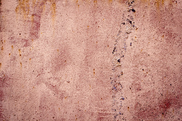 Colored pink rusty iron metal wall texture background