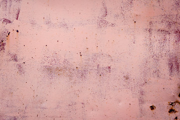 Colored pink rusty iron metal wall texture background