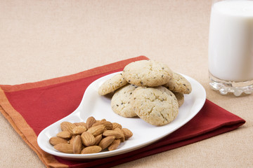 Sesame Seeds Biscuits, Dry Fruit and Glass of Milk