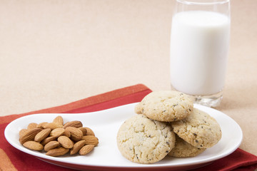Sesame Seeds Biscuits, Dry Fruit and Glass of Milk