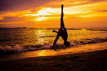 Man jumps on the beach