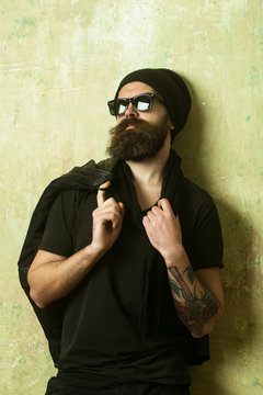 biker or hipster man in glasses, hat
