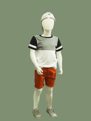 Child mannequin dressed in casual clothes.