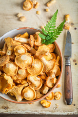 Wild mushrooms in an old clay bowl