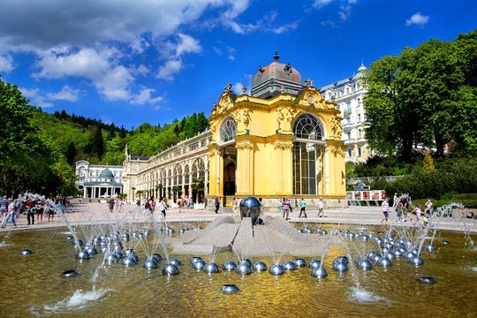 Mari&aacute;nsk&eacute; L&aacute;zně (Marienbad): main cast iron colonnade and Singing fountain - great and famous Czech spa town in the west part of the Czech Republic (region Karlovy Vary)