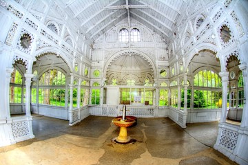 Wooden pavilion of cold mineral water spring Rudolf - park in the great Czech spa town Marianske...