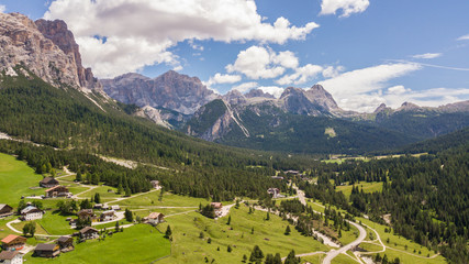 Aerial view from the end of the village of San Cassiano towards Passo Falzarego