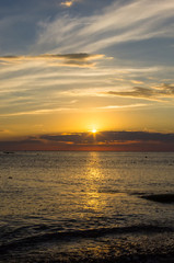 Amazing sea sunset, the sun, waves, clouds