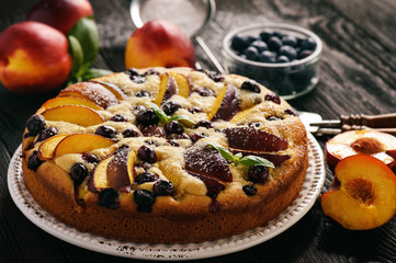 Homemade cake with nectarines and blueberries.