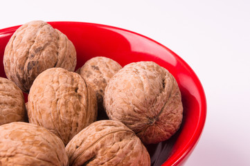walnuts in red plate