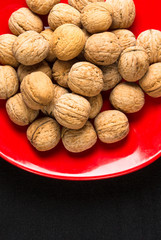 walnuts in red plate