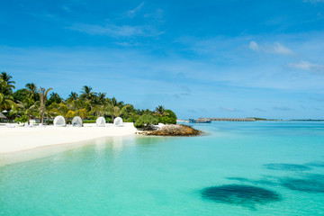 Chill lounge zone on the sandy beach, Maldives island