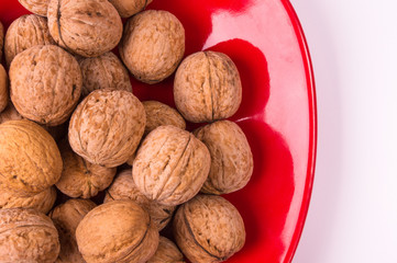 walnuts in red plate
