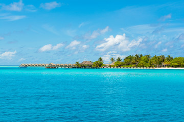 Over water wooden pier for boats and seaplanes,  Maldives island