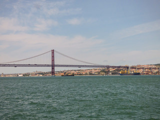 The river Tagus and the bridge 25th of April - Lisbon, Portugal