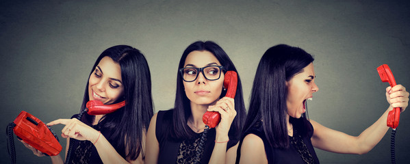 woman dialing number on vintage telephone curiously listening and getting angry screaming on the...