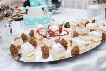 Candy Bar. Delicious sweet buffet with cupcakes. Sweet holiday buffet with cupcakes and other desserts.Table with sweets, candies, dessert,happy birthday concept