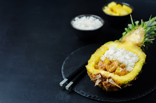 Pineapple stuffed rice with pineapple cashews chicken