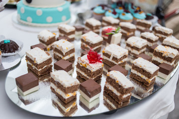 Candy Bar. Delicious sweet buffet with cupcakes. Sweet holiday buffet with cupcakes and other desserts.Table with sweets, candies, dessert,happy birthday concept