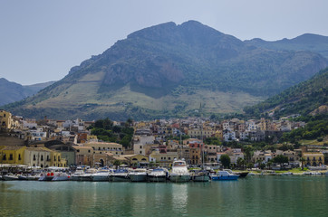 Naklejka na ściany i meble view of the town of castellammare del golfo and its pier