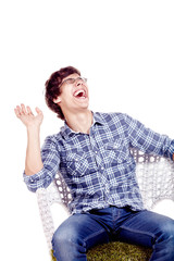 Laughing man on chair