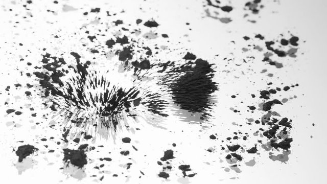 Grey magnetic sand joins together, macro close up