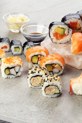 close up of sashimi sushi set with chopsticks and soy - sushi ro