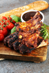 Spicy hot grilled spare ribs from a summer BBQ served with fresh