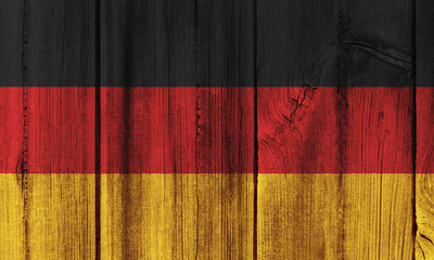 Germany flag painted on wooden wall for background