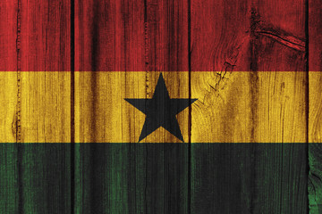 Ghana flag painted on wooden wall for background