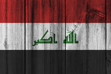 Iraq flag painted on wooden wall for background