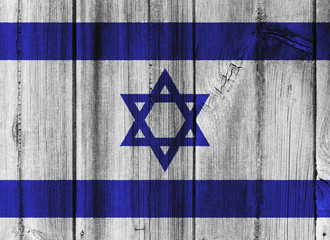 Israel flag painted on wooden wall for background