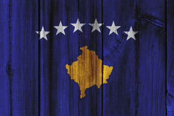 Kosovo flag painted on wooden wall for background