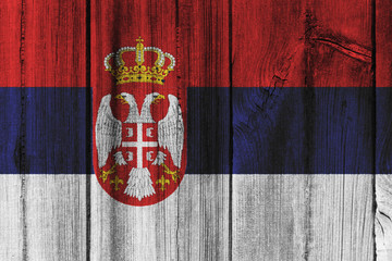 Serbia flag painted on wooden wall for background