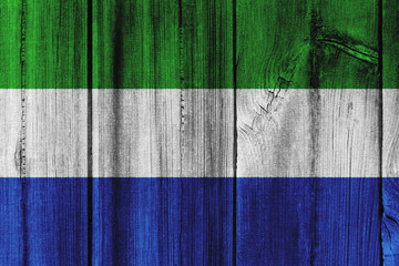 Sierra Leone flag painted on wooden wall for background