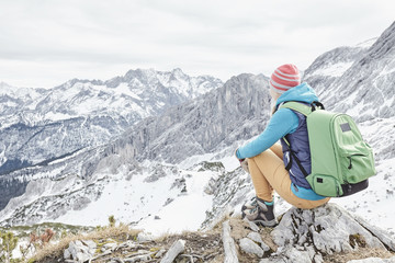 Tourist at winter mountains