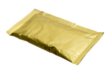 Close up of golden aluminum bags on white background.