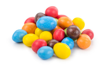 Portion of Cocolate coated Peanuts isolated on white