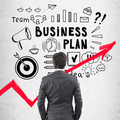 Businessman business planning, red graph