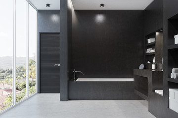 Black bathroom with a window