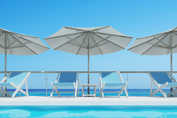 Blue deck chairs, umbrellas, blue sky