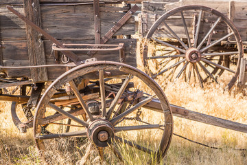 Fototapeta na wymiar Abstract of Vintage Antique Wood Wagons and Wheels.