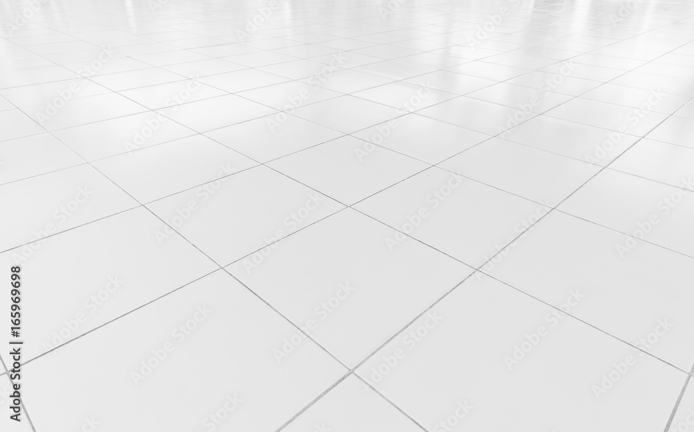 Wall mural white tile floor background in perspective view. clean, shiny, symmetry with grid line texture. for 