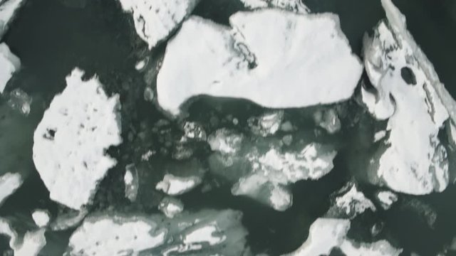 Overhead aerial, frozen glaciers in Iceland